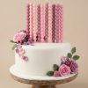 roza-tortes-sveces (2) Rozā bumbiņu dzimšanas dienas sveces elegantas tortes dekorā